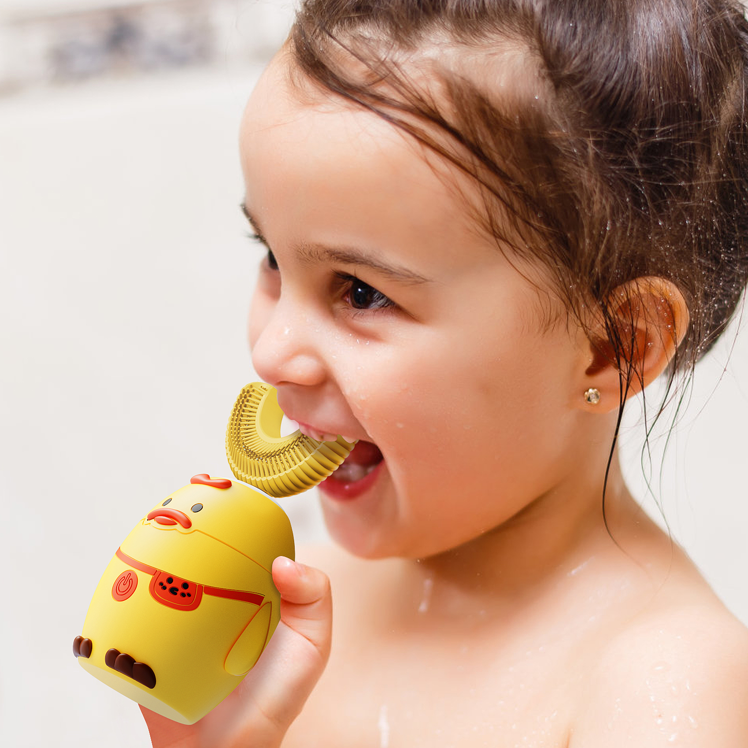 Children enjoying brushing with a U-shaped electric toothbrush